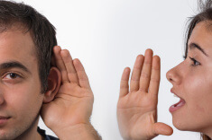 stock-photo-57920752-yound-girl-whispering-in-man-s-ear