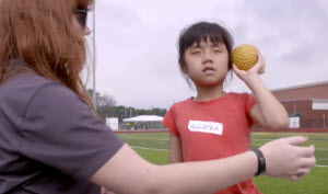 7 year old Anneka playing catch