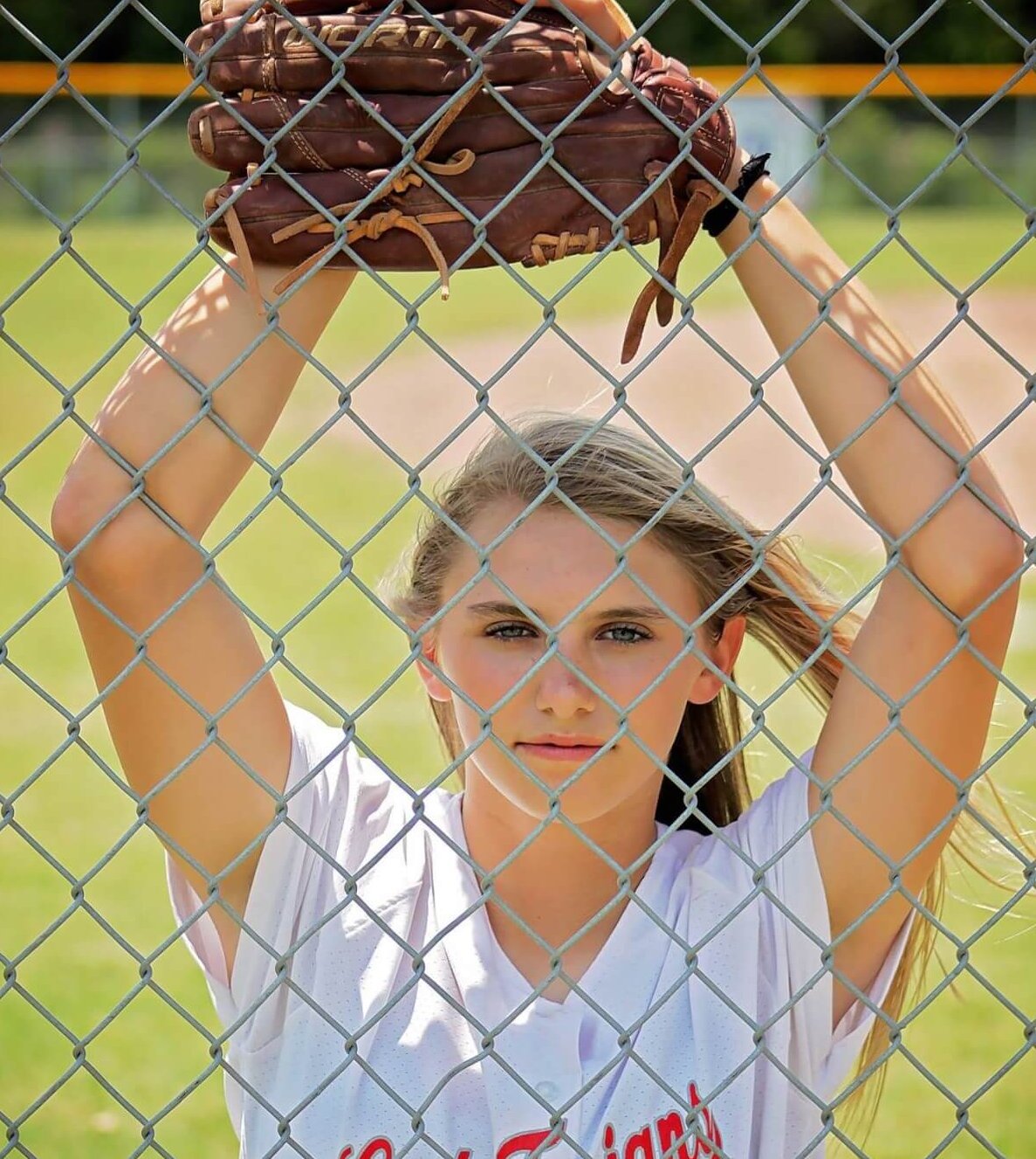 girl_young_glove_fence_outdoors_softball_player_expression-878973